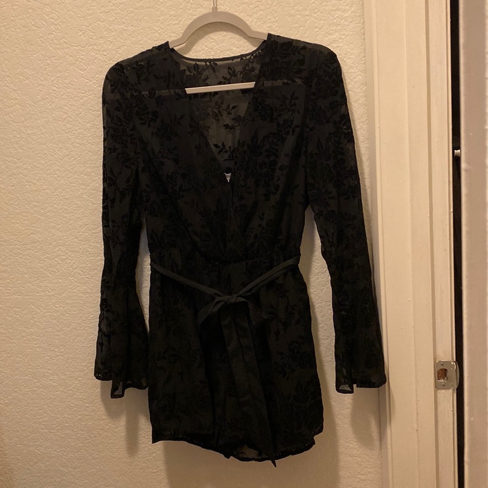 Small, black, floral romper - not worn